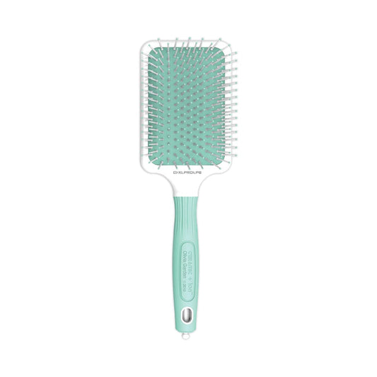 Olivia Garden pastel green cushion paddle brush with white ionic bristles, on a plain white background