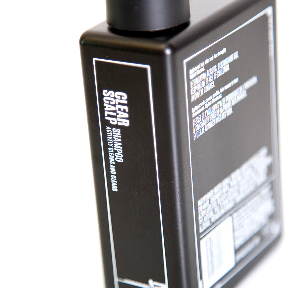 Uppercut Deluxe Clear Scalp Shampoo 240 ml — black 240 ml shampoo bottle, side panel with ingredients