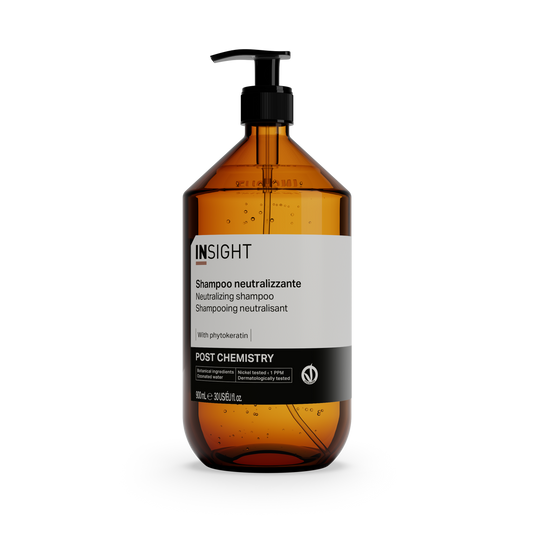 Insight Neutralizing Shampoo 900ml — official brand packshot of the current 900 ml package, tall amber 900 ml bottle with black lotion pump, front label facing camera, plain black background
