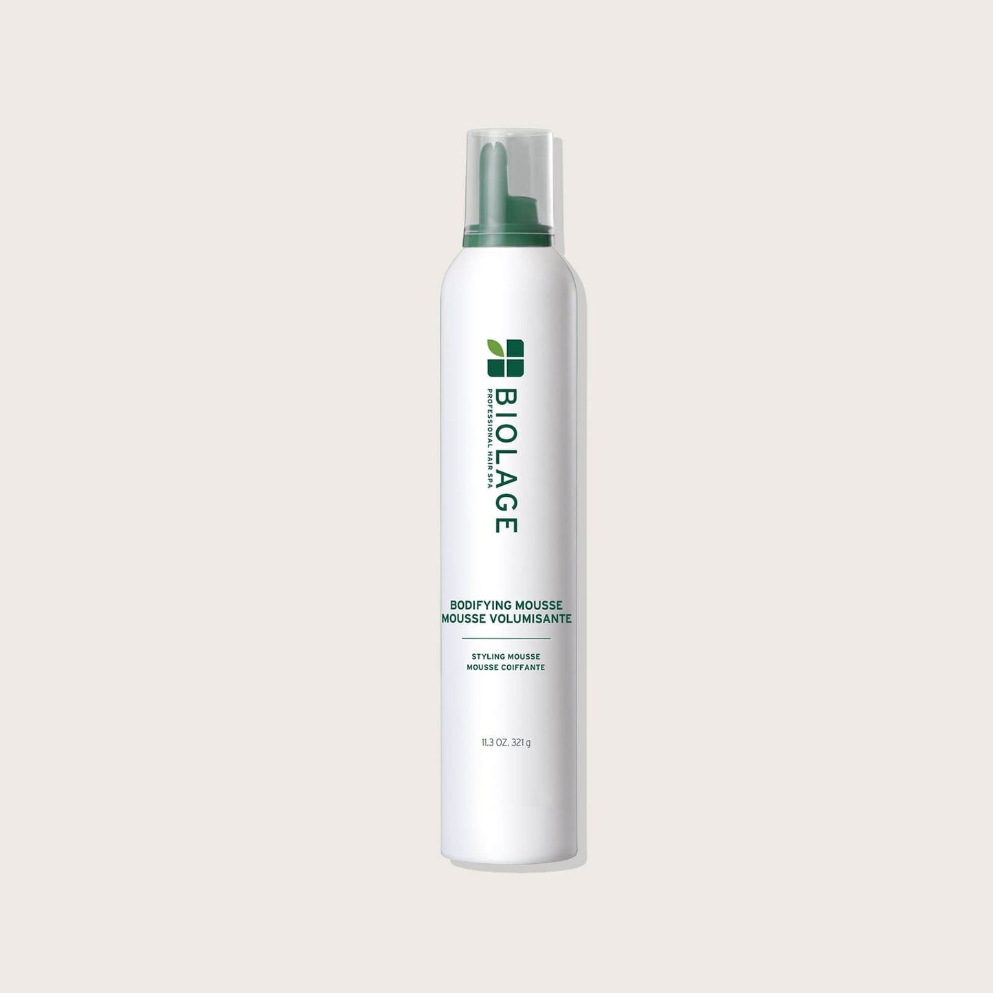 Biolage Bodifying Mousse 329 g — aerosol can on a warm neutral background