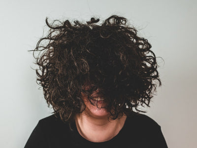 Frizzy Hair logo