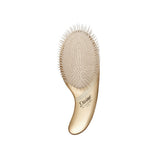 Olivia Garden Divine DV-3 detangling brush, gold oval cushion brush, on a plain white background