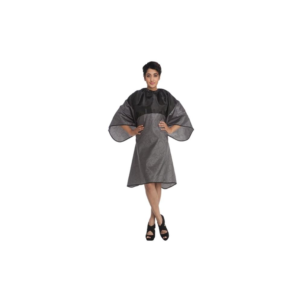 Olivia Garden Slim salon cape in grey and black, shown worn, on a plain white background
