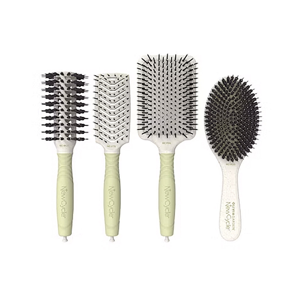 Olivia Garden NewCycle styling brush set of 4 — round smoothing, vent styler, large paddle and oval smoothing paddle laid out on a plain white background