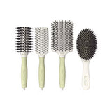 Olivia Garden NewCycle styling brush set of 4 — round smoothing, vent styler, large paddle and oval smoothing paddle laid out on a plain white background