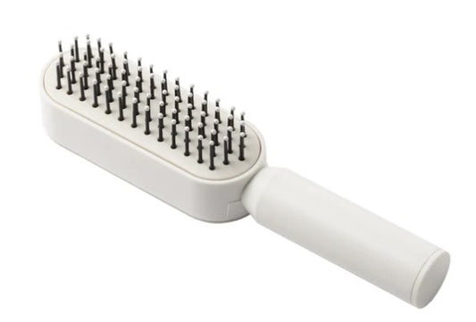 milk_shake Mini Hair Brush — White distributor packshot, plain white background