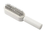 milk_shake Mini Hair Brush — White distributor packshot, plain white background