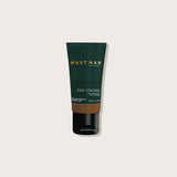 Must Man Professional Stay Strong Styling Gel — 50 ml tube, front label, plain off-white background