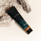 Must Man Professional Stay Strong Styling Gel — 150 ml tube tilted on a warm neutral background