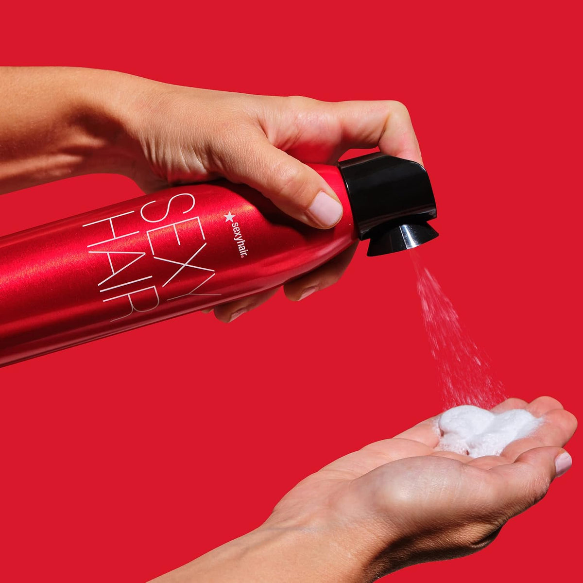 SexyHair Big Root Pump Plus Volumizing Spray Mousse — mousse being dispensed from the can into a hand