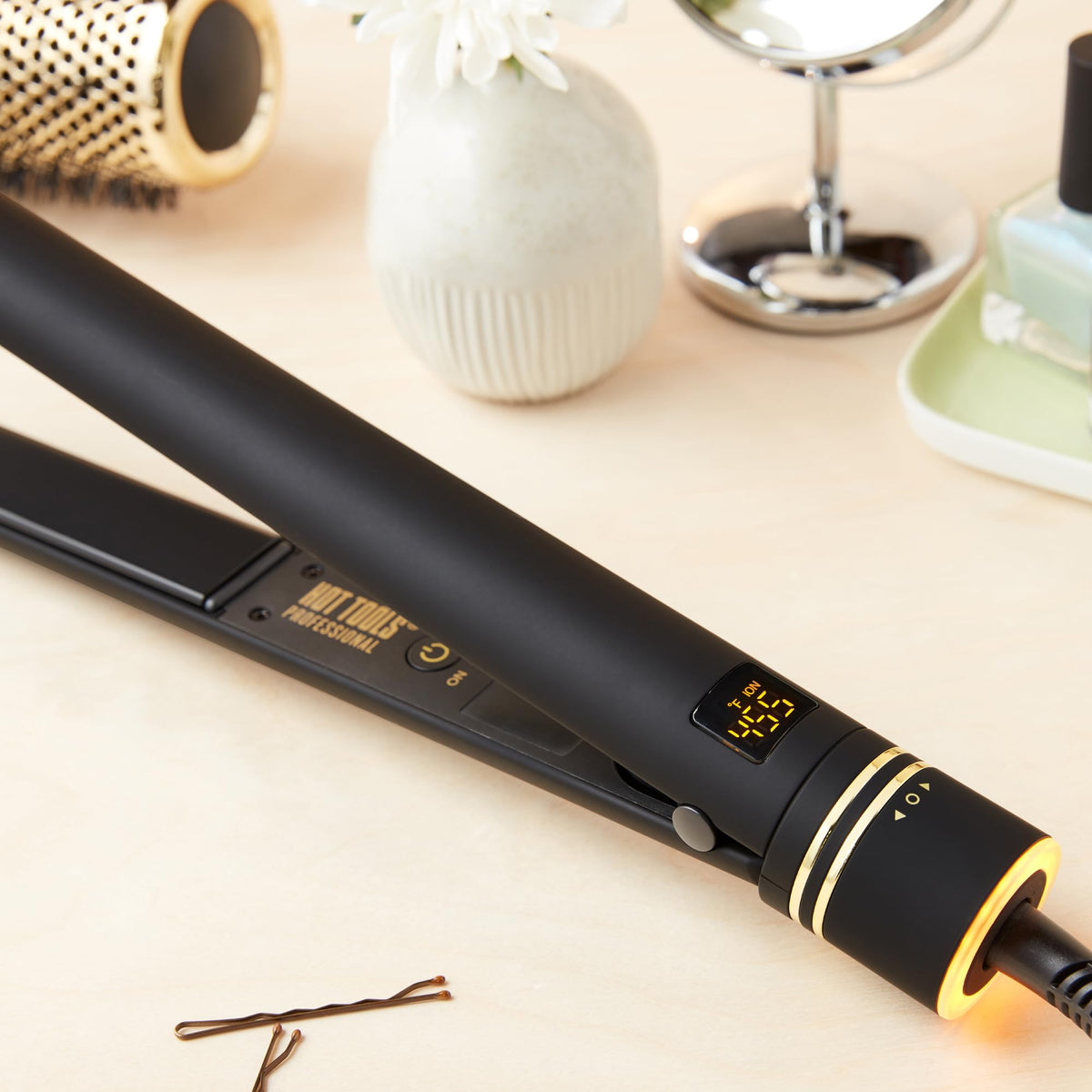 Hot Tools Black Gold Professional Hair Straightener 25 mm — black and gold plates, angled view