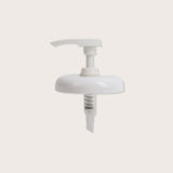 Matrix mask pump — white plastic wide-collar dispensing pump for a 500 ml masque jar, shown upright on a plain background