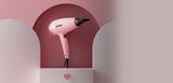 GHD – Helios Professional Hair Dryer – Dusted Pink — dusted pink dryer shown against a pale pink set