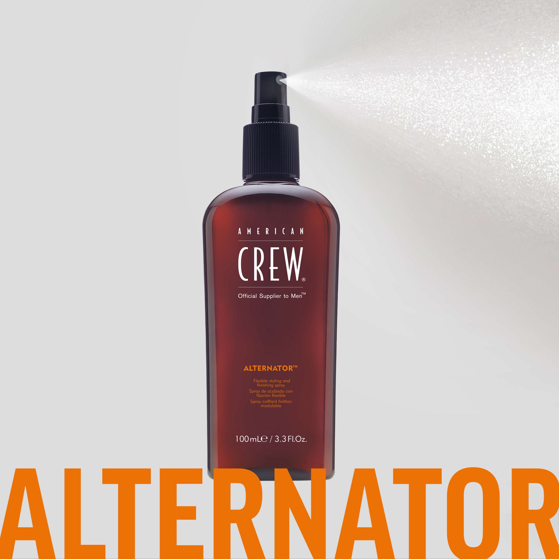 American Crew Alternator Finishing Spray 100ml — 100 ml bottle releasing a fine mist against a pale backdrop