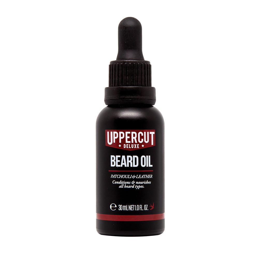 Uppercut Deluxe Beard Oil 30 ml — 30 ml amber glass beard oil bottle with dropper, front label, white background