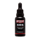 Uppercut Deluxe Beard Oil 30 ml — 30 ml amber glass beard oil bottle with dropper, front label, white background