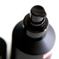 Uppercut Deluxe Beard Balm 100 ml — close-up of the beard balm bottle cap and shoulder