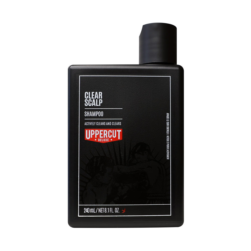 Uppercut Deluxe Clear Scalp Shampoo 240 ml — black 240 ml shampoo bottle, front label, plain white background
