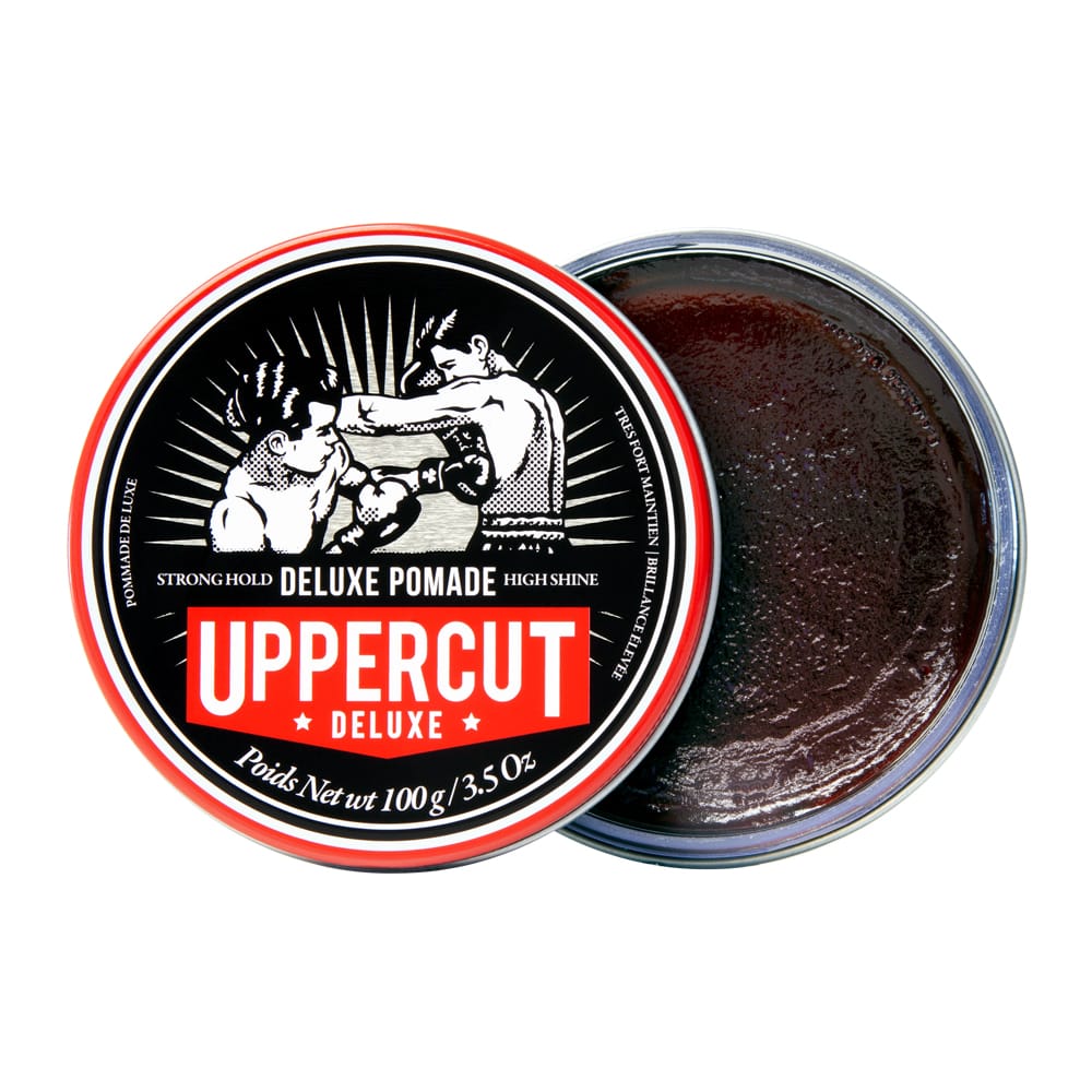Uppercut Deluxe Pomade — 100 g tin open showing the pomade, plain white background
