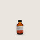 Insight Color Protective Shampoo 100ml — official brand packshot of the current 100 ml package, amber bottle, front label facing camera, warm beige background