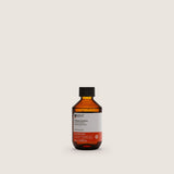 Insight Color Protective Shampoo 100ml — official brand packshot of the current 100 ml package, amber bottle, front label facing camera, warm beige background