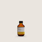 Insight Nourishing Shampoo 100ml — official brand packshot of the current 100 ml package, amber bottle, front label facing camera, warm beige background
