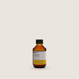 Insight Nourishing Shampoo 100ml — official brand packshot of the current 100 ml package, amber bottle, front label facing camera, warm beige background