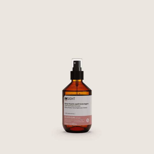 Insight Light Hold Fixative Hair Spray 150ml — official brand packshot of the current 150 ml package, amber bottle with black fine-mist spray and clear over-cap, front label facing camera, warm beige background