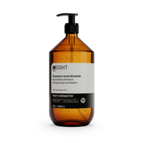 Insight Neutralizing Shampoo 900ml — official brand packshot of the current 900 ml package, tall amber 900 ml bottle with black lotion pump, front label facing camera, plain black background