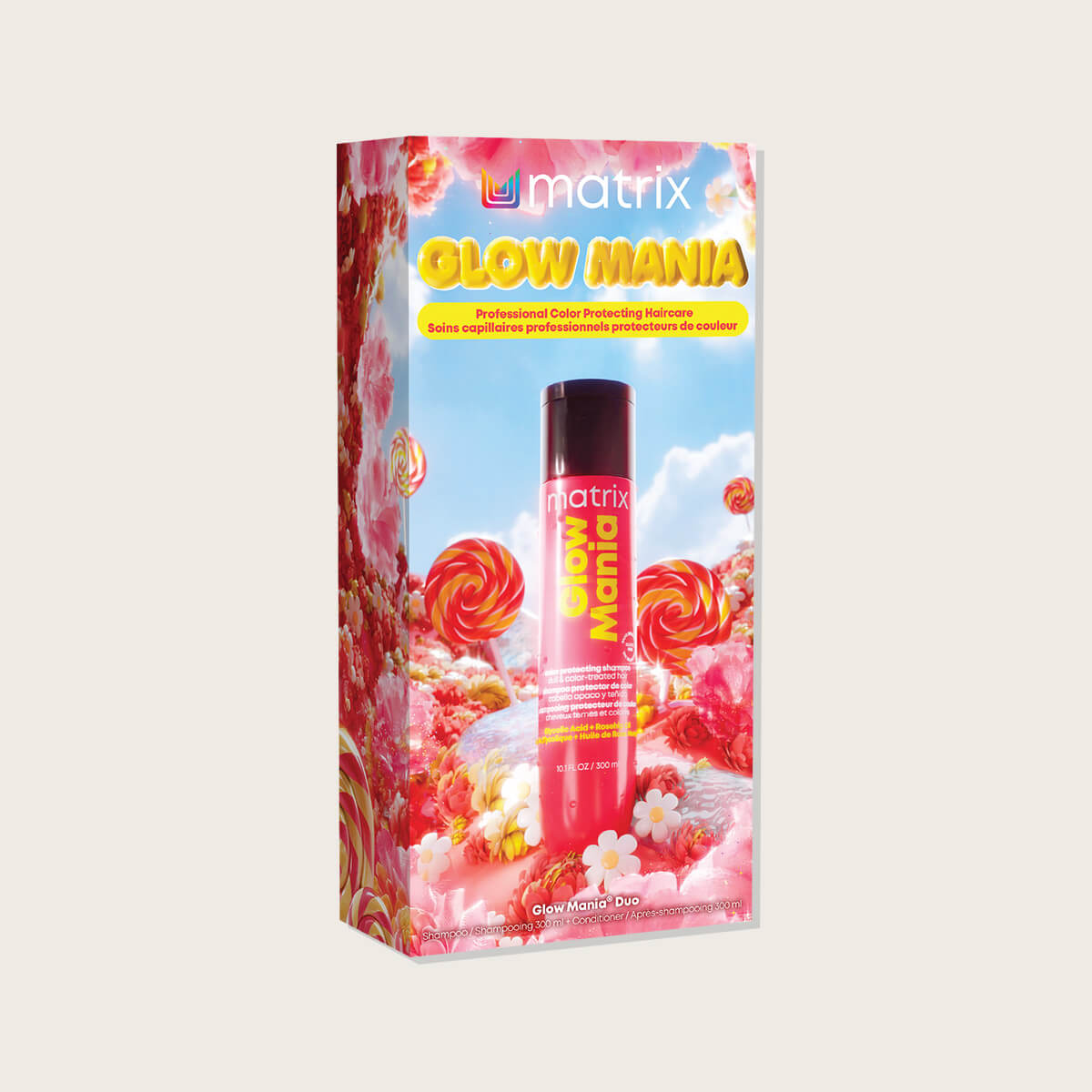 Matrix Glow Mania Holiday Kit 2026 — pink candy-landscape gift carton with the pink Glow Mania bottle standing in front of it