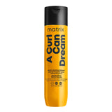 Matrix A Curl Can Dream Shampoo – current livery, yellow 300 ml bottle without the retired Total Results wordmark, front label, plain white background
