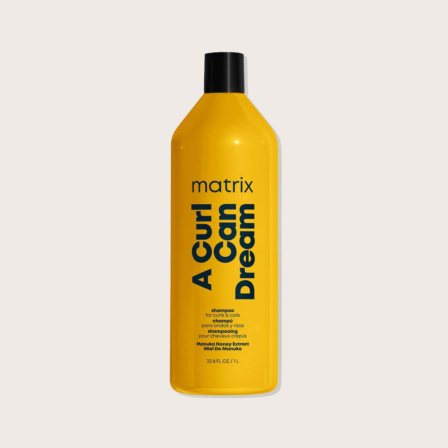 Matrix A Curl Can Dream Shampoo – current livery, yellow 1 L salon bottle without the retired Total Results wordmark, front label