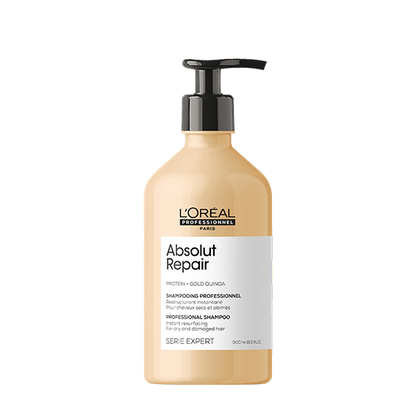 L'Oréal Professionnel Absolut Repair Shampoo — 500 ml gold pump bottle photographed on a black background
