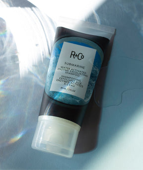 R+CO - Submarine - Shampooing exfoliant aux enzymes activées par l'eau | 3 oz | 