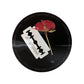 Uppercut Deluxe Resin & Rose Pomade — 100 g limited-edition tin lid with the razor and rose artwork, top-down