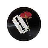 Uppercut Deluxe Resin & Rose Pomade — 100 g limited-edition tin lid with the razor and rose artwork, top-down