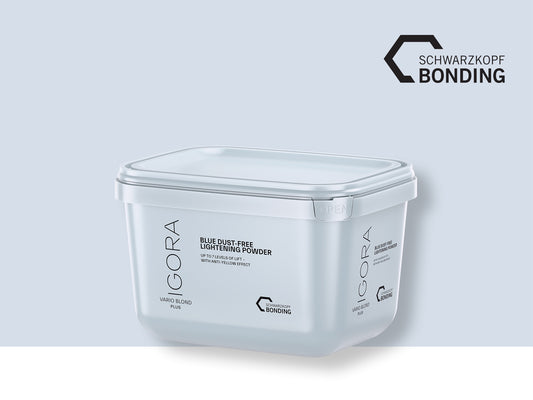 Schwarzkopf Professional IGORA Vario Blond Plus — current-livery 450 g tub, blue dust-free lightening powder, front label, plain background
