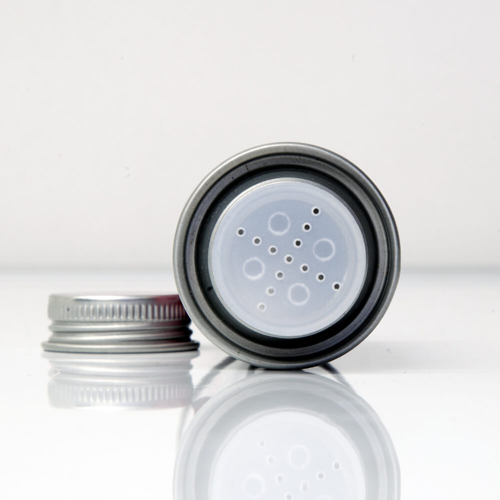 Uppercut Deluxe Styling Powder — 20 g tin with the shaker cap removed, showing the sifter