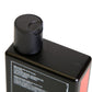 Uppercut Deluxe Strength & Restore Shampoo — 240 ml bottle shoulder and cap close-up