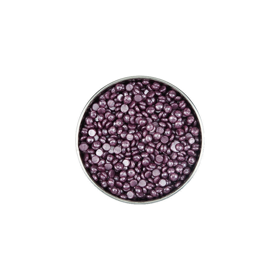 Satin Smooth Amethyst Crystal Pebble Wax — overhead view of the purple wax pebbles