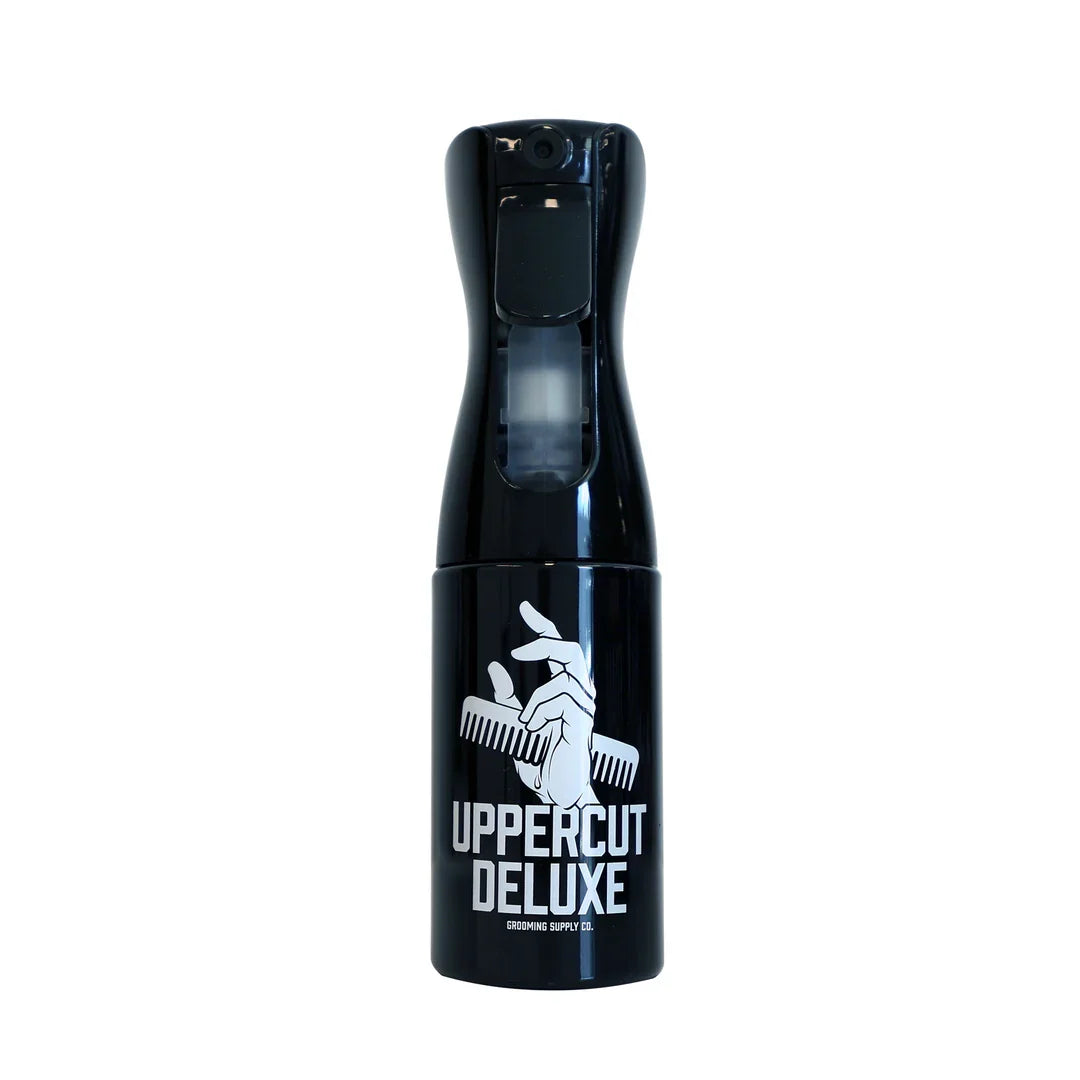 Uppercut Deluxe Barber Spray Bottle — 160 ml bottle angled, showing the trigger head
