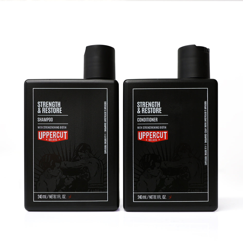 Uppercut Deluxe Strength & Restore Duo — retail pair, the 240 ml shampoo beside the 240 ml conditioner, plain white background