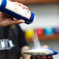 Johnny B Barber Talc — in-use barber application
