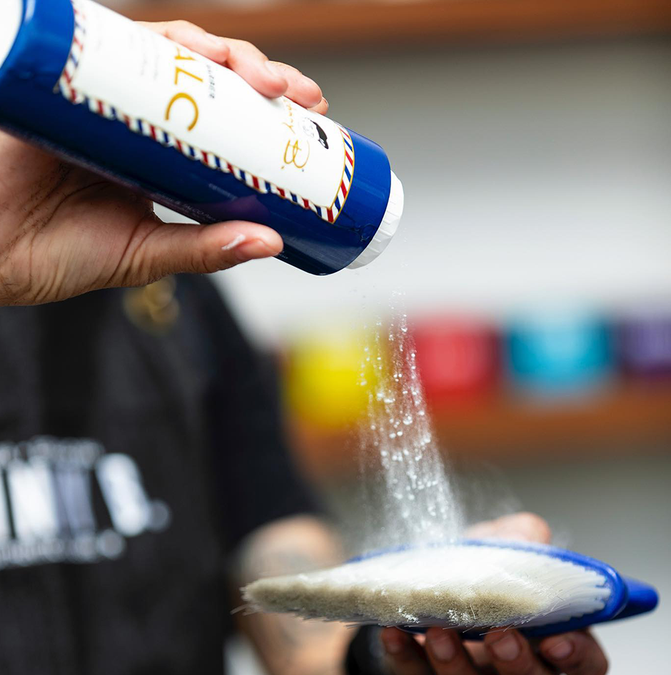Johnny B Barber Talc — in-use barber application