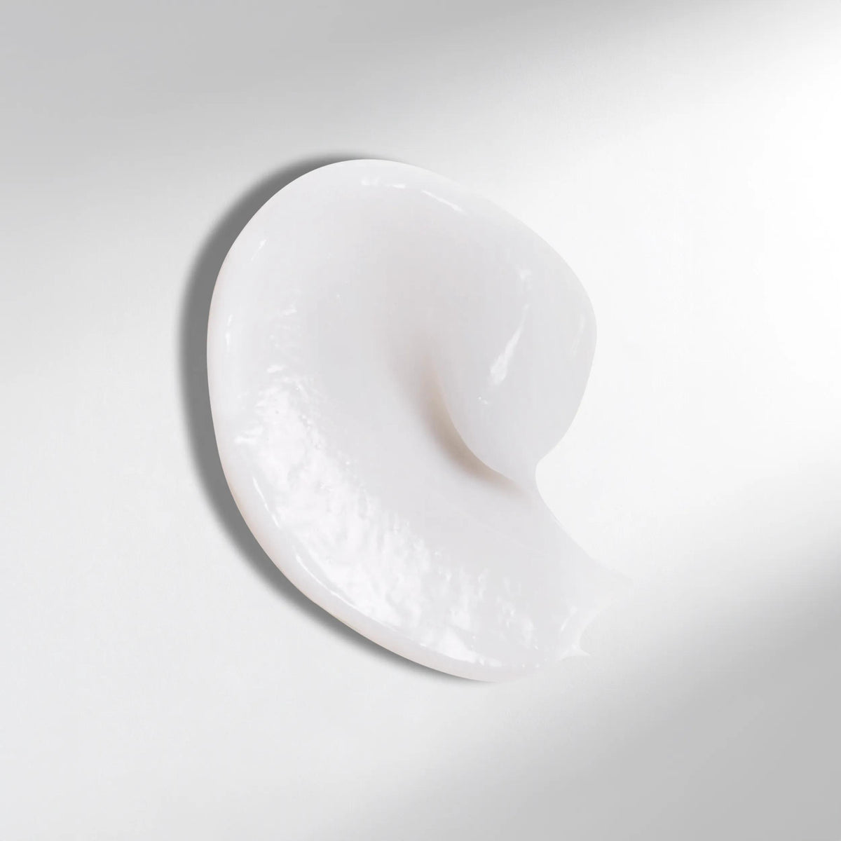 Wella Professionals Ultimate Smooth — Drop of Wella Professionals Ultimate Smooth Conditioner. Text reads rich, nourishing texture.