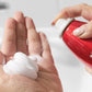 SexyHair Big Root Pump Volumizing Spray Mousse — mousse being dispensed from the can into a hand