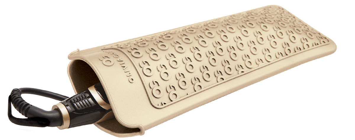 Olivia Garden Ceramic + Ion Flat Iron — the included heat-resistant mat rolled around the iron, plain white background