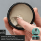D:Fi Matte Clay — open jar held in hand showing the clay texture on a fingertip
