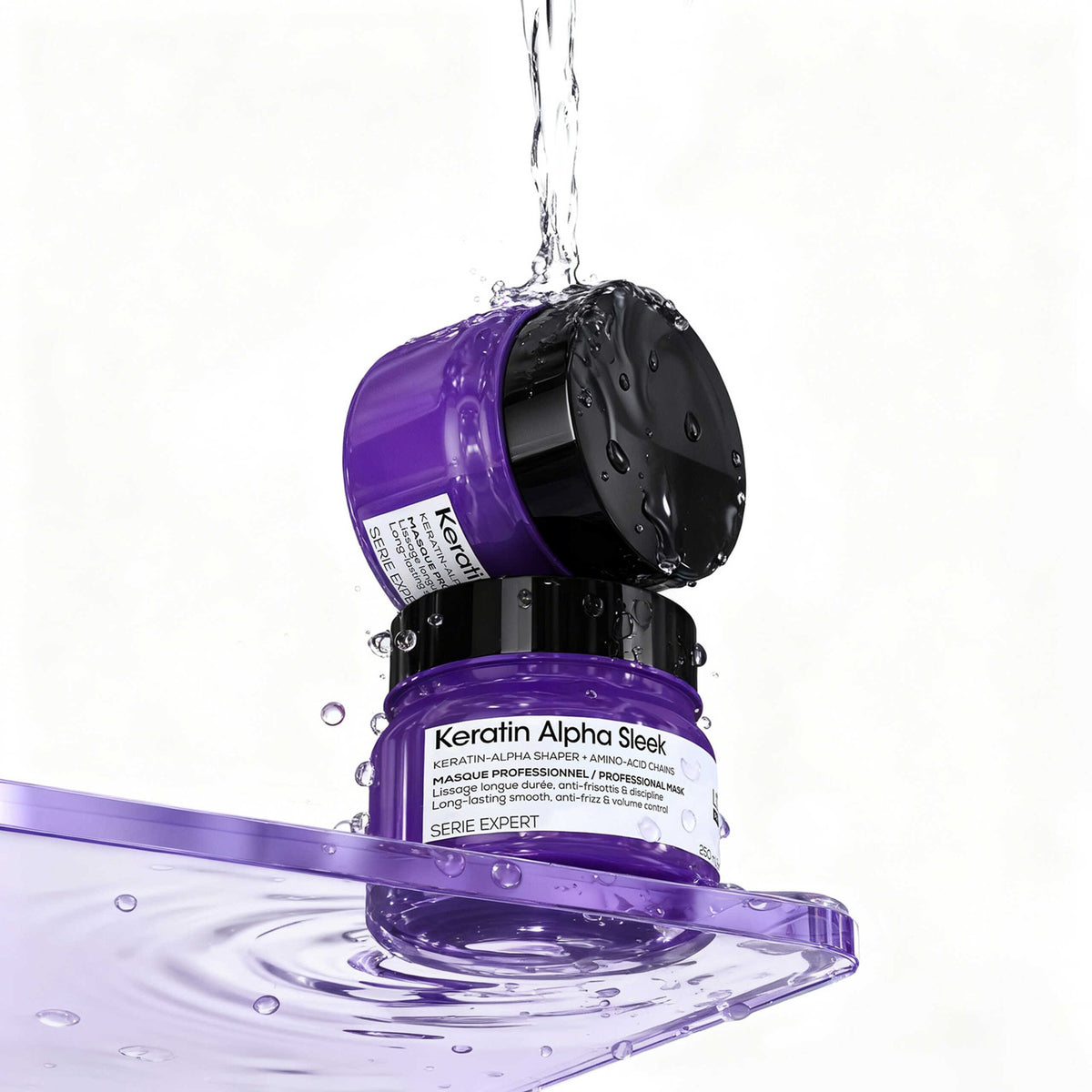 L'Oréal Professionnel Keratin Alpha Sleek Mask — open jar under running water, lid off