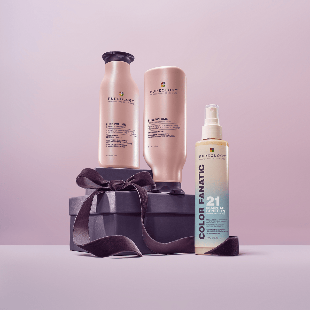 Pure Volume Holiday Trio - the three bottles in the set styled with a gift ribbon